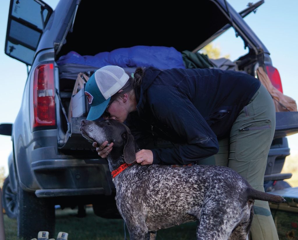 The author, a Montana resident, with her bird dog.