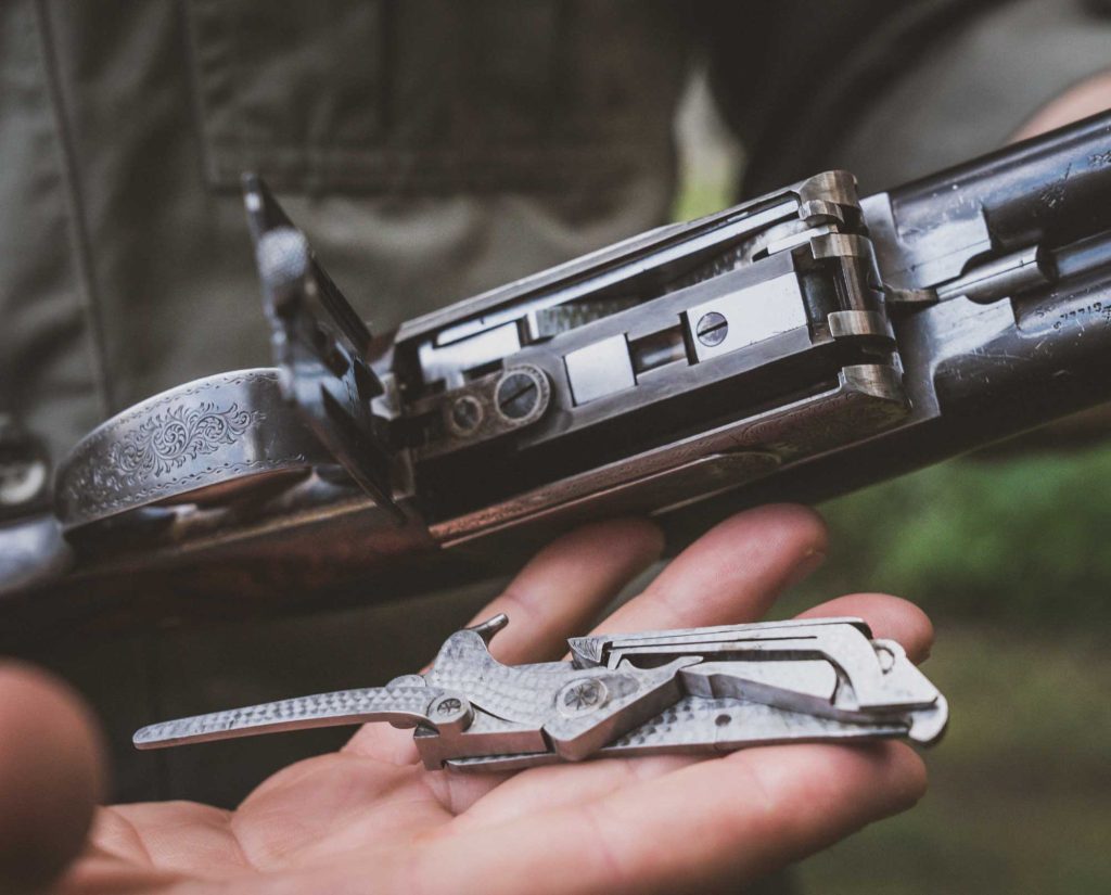 A look at a hammer mechanism from inside a boxlock shotgun.